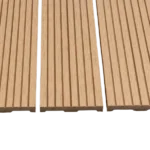 Close-up of grooved wood-plastic composite slats.