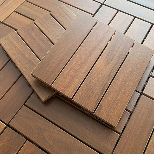 Close-up of interlocking brown natural wood deck tiles