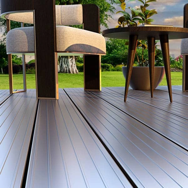 Modern silver aluminum deck planks with patio furniture